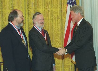 [ Ken Thompson and Dennis Ritchie at the 

White House with President Clinton ]