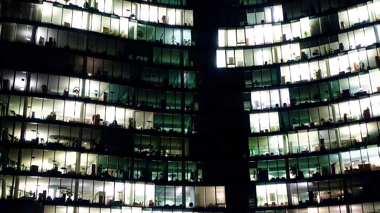 Lit windows in an office block