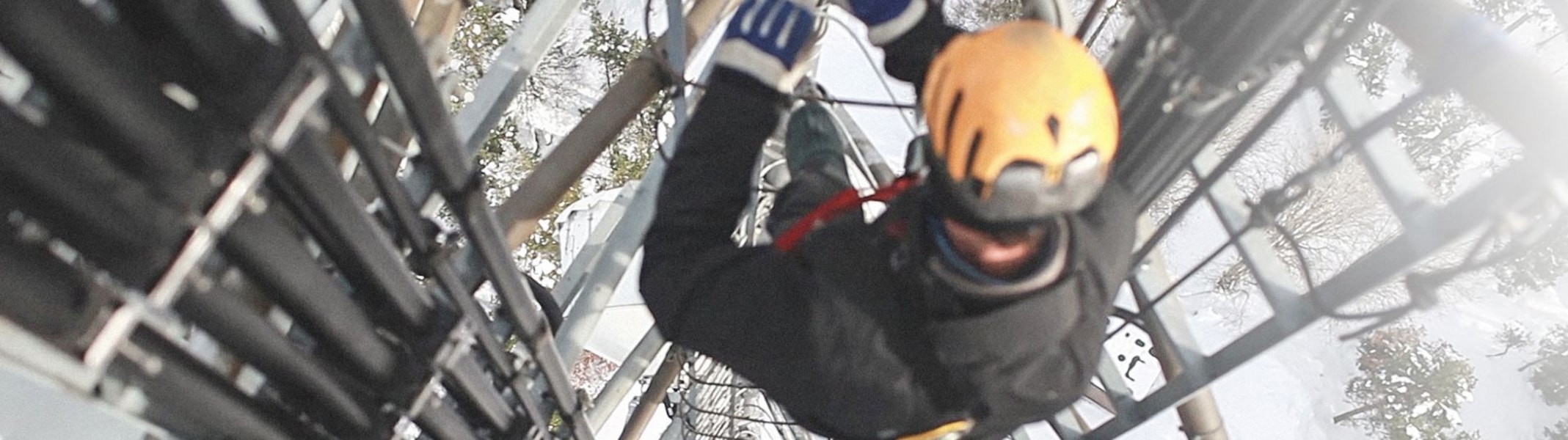 man climbing a mast