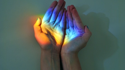 rainbow colors seen on hands