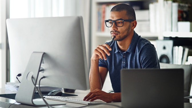 man working on computer