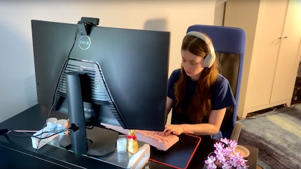 A summer intern working on their computer.