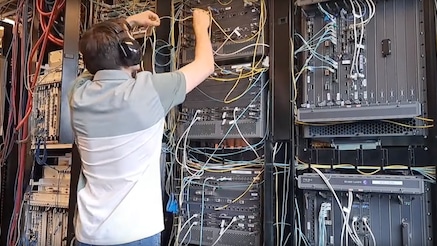 A summer intern working on servers.