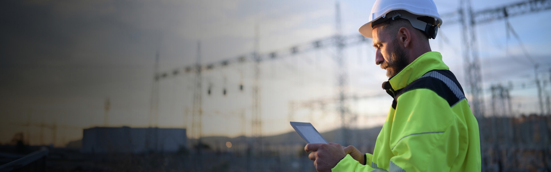 Engineer in hi-viz jacket at power station