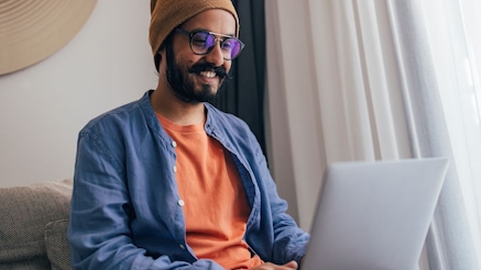 man working on laptop