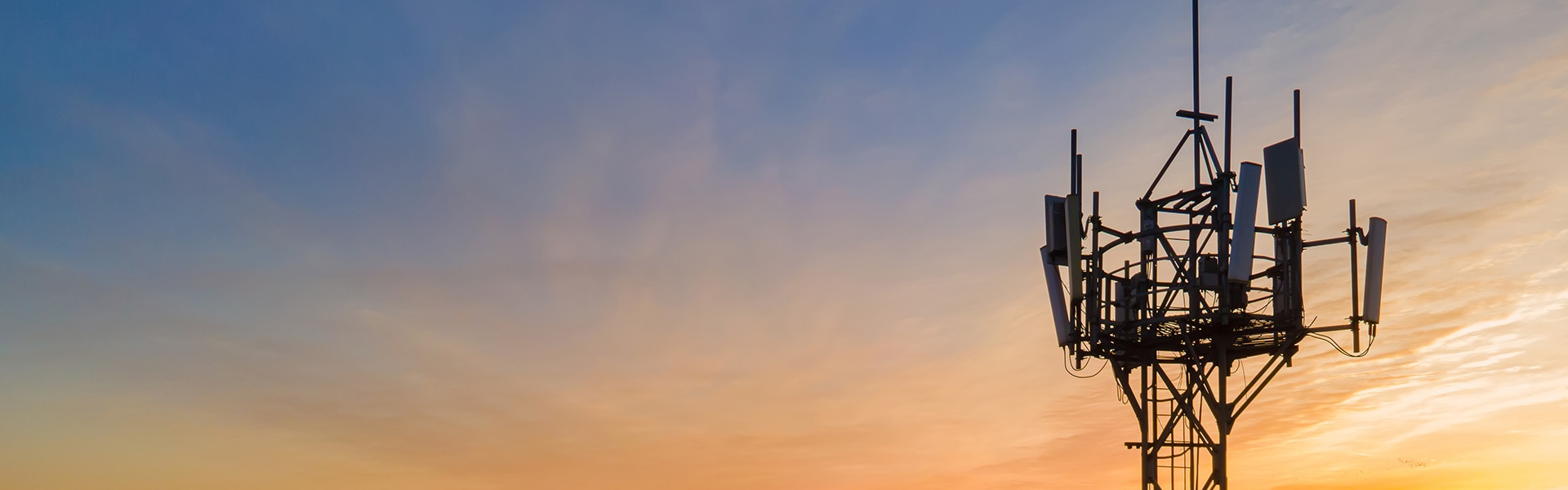 Communications mast at sunset