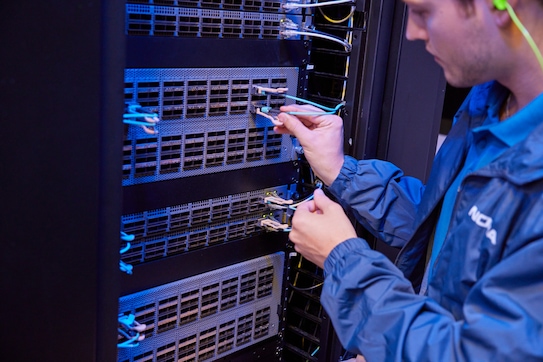 Nokia technicians working on IP routers