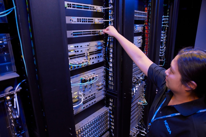 Nokia technicians working on IP routers