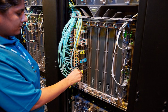 Nokia technicians working on IP routers