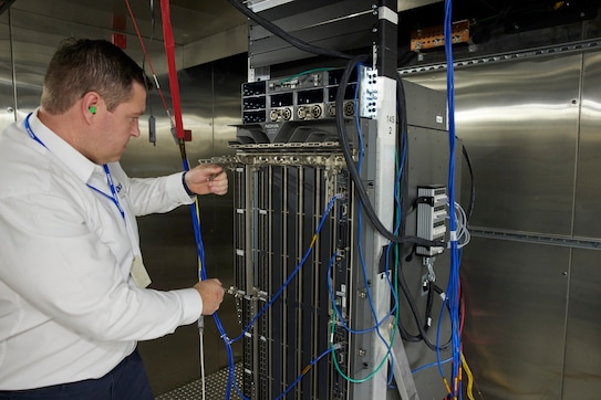 Nokia technicians working on IP routers