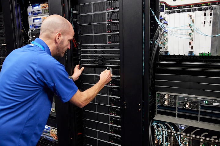 Nokia technicians working on IP routers