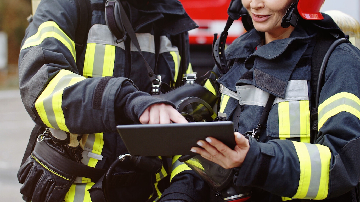 Firefighters using a tablet