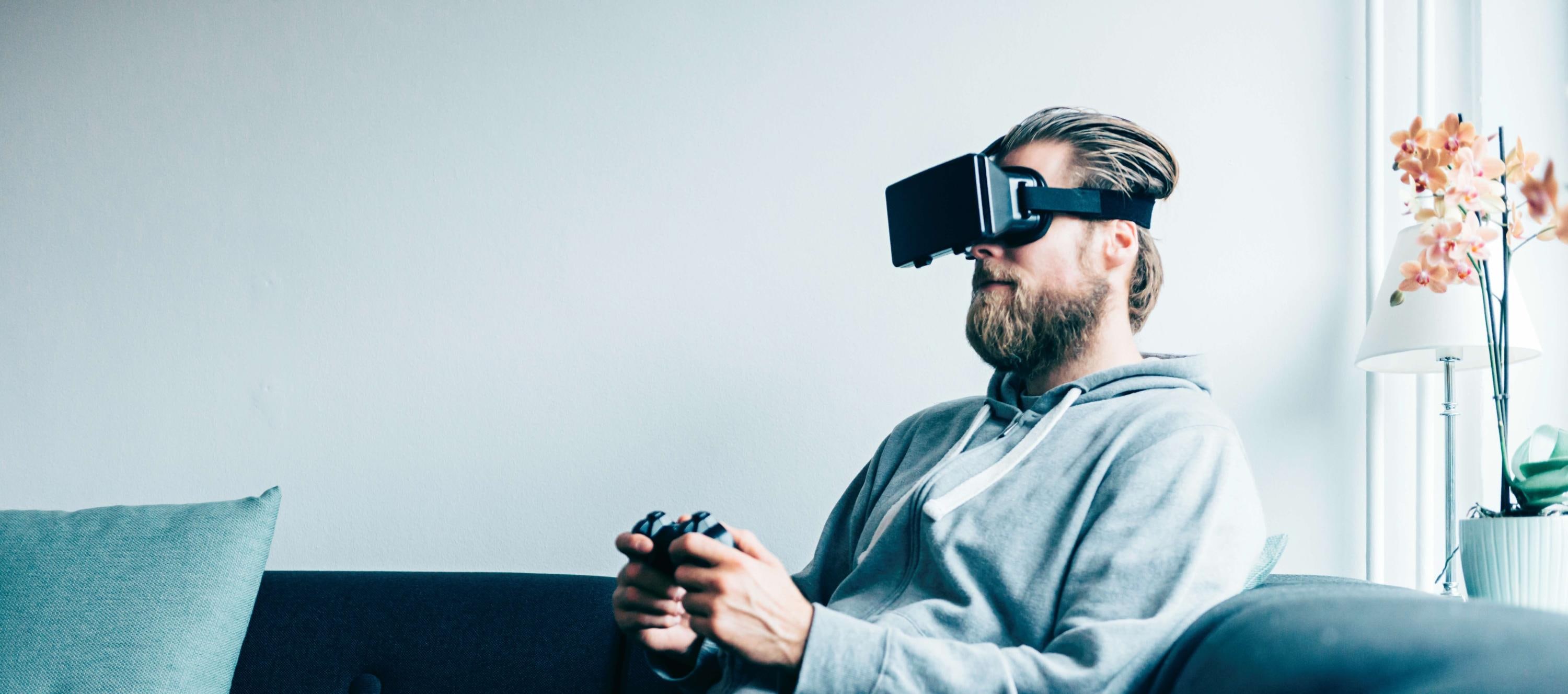 A man playing a game using a VR headset