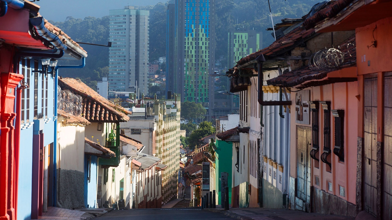 City street with skyscrapers in background