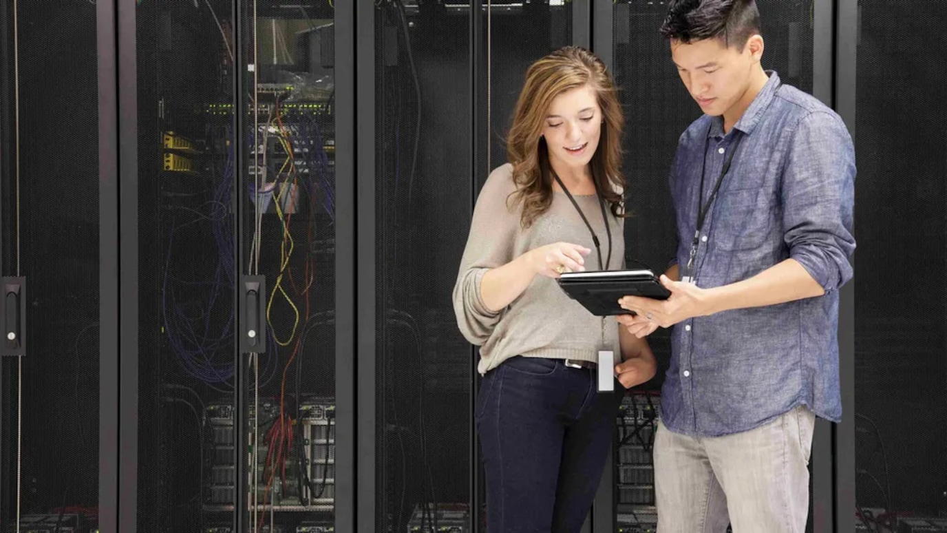 Workers in a server room