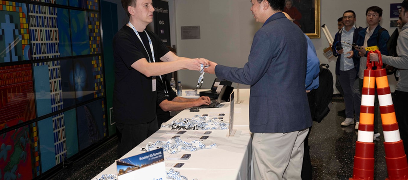 Registration table at Brooklyn 6G Summit 2024