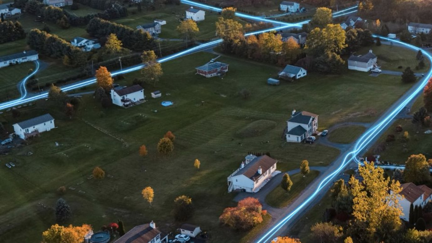 Rural town with fibre lines racing through