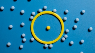 yellow ring and light blue balls