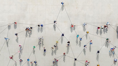 Aerial view of crowd people connected by lines symbolizing networks