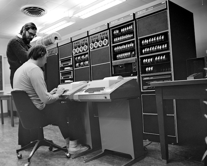 In the 1960s and 1970s, Dennis Ritchie (left, standing) and Ken Thompson (right, sitting) developed Unix, arguably the world’s most important computer operating system since it paved the path to the internet.