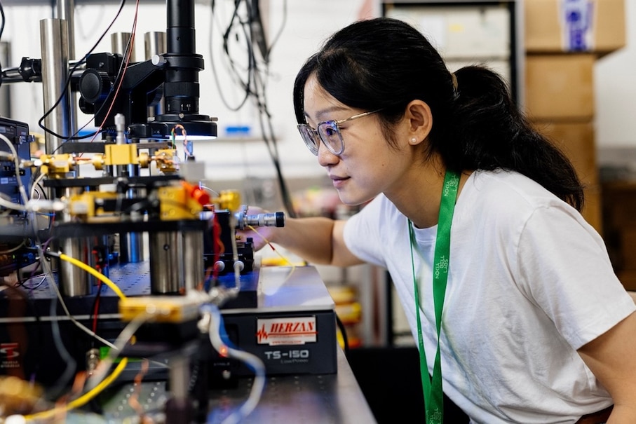 A Nokia Bell Labs optical researcher working in the lab