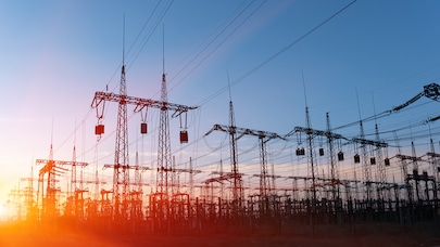 Electricity pylons at sunset