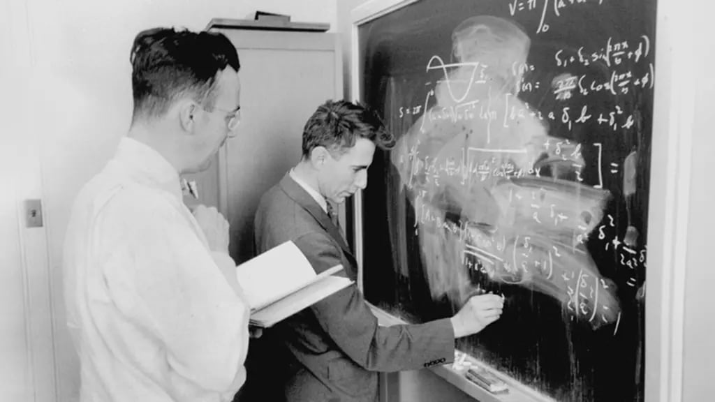 Claude Shannon writing mathematical equations