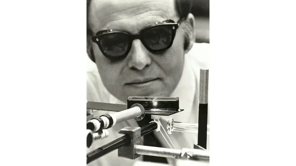 Arthur Ashkin using a high-powered laser