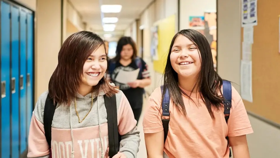 Two indigenous girls in school