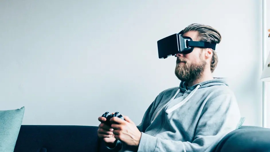 A man playing a game using a VR headset