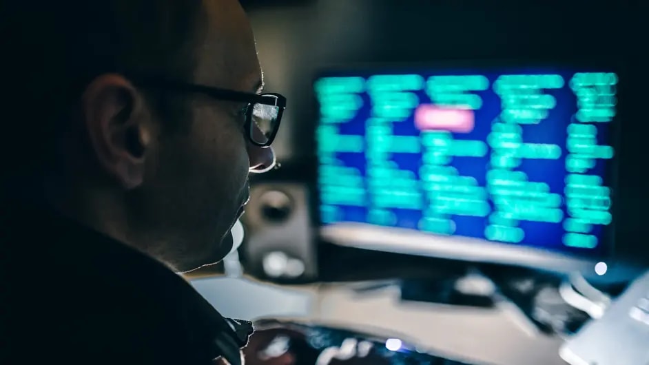 Man looking at a computer screen