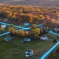 Fluorescent blue light connects houses in rural community