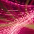 An abstract image with blurry, glowing red waves.